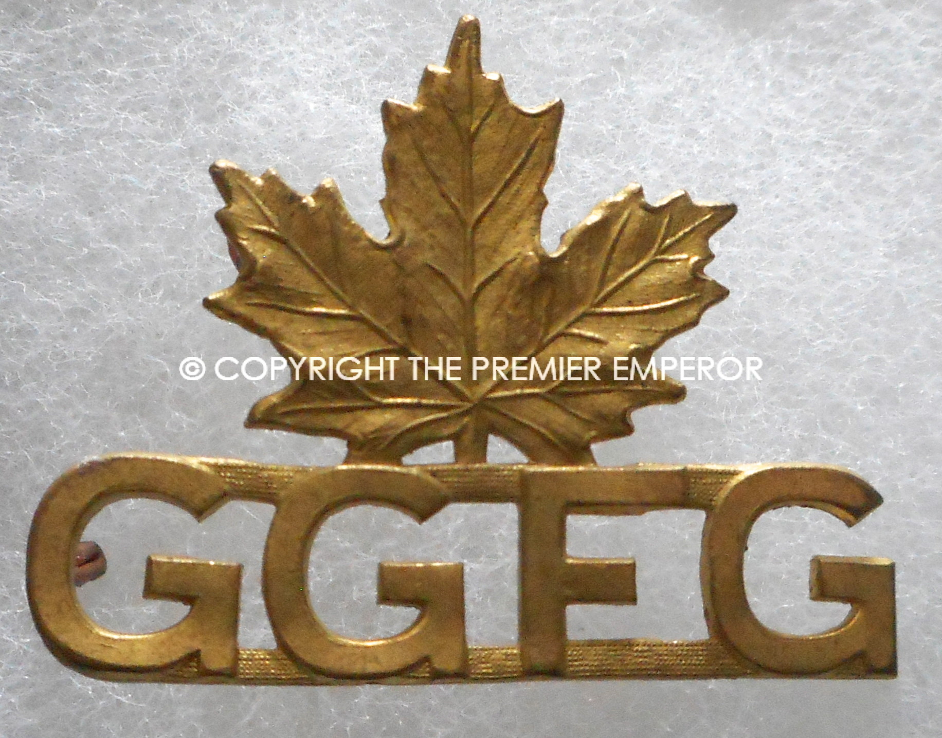 Canada. Governor Generals Foot Guards brass shoulder title.