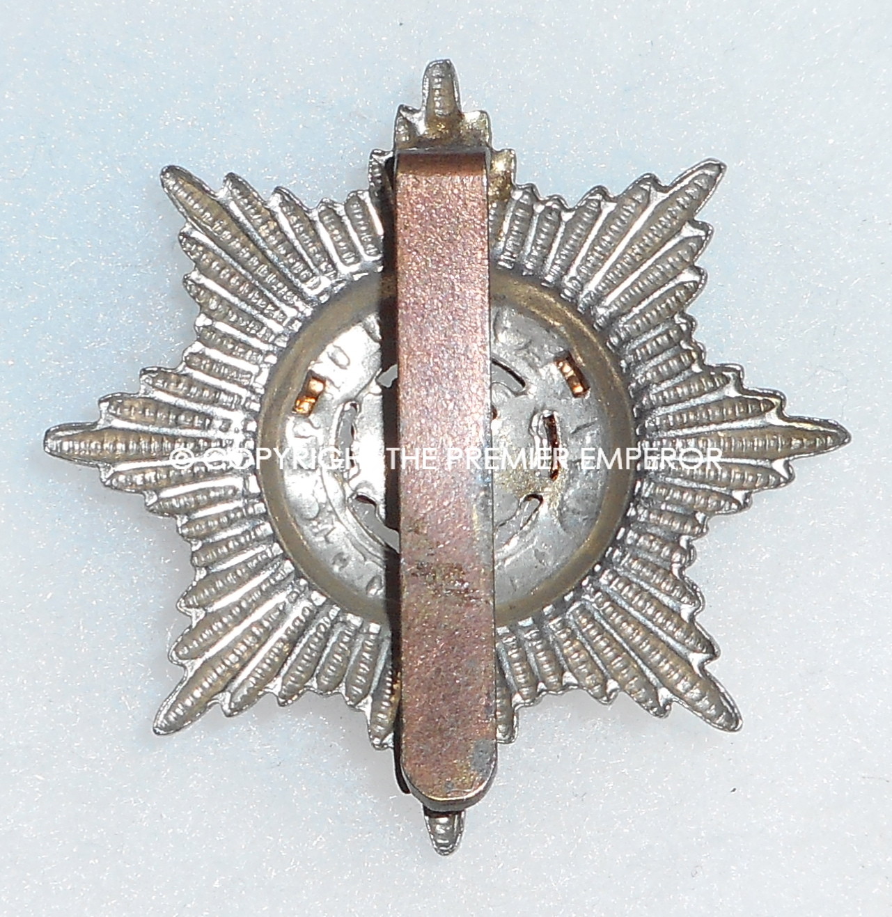 British. The Cheshire Regiment cap badge.