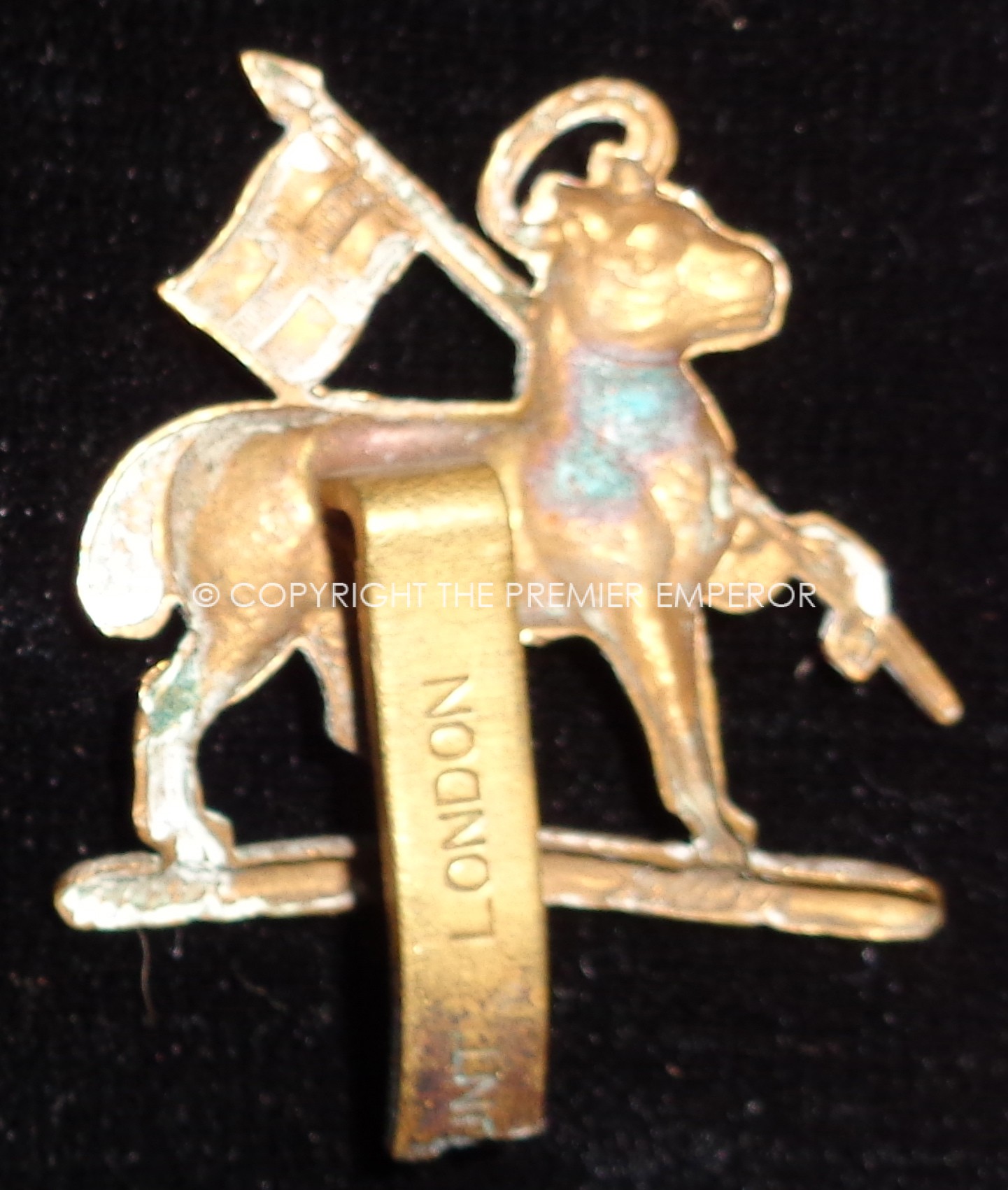 British. The Queen's Royal Regiment beret badge.Circa.Post 1949