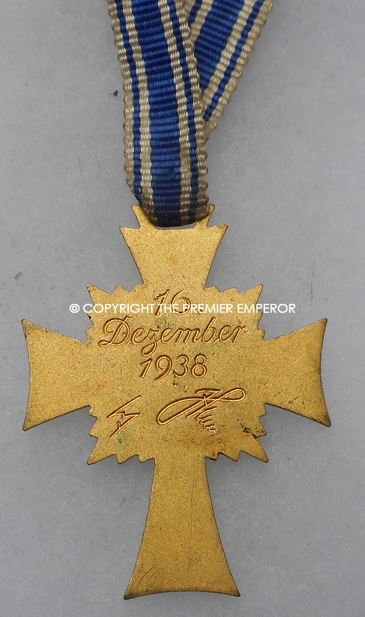 German Mothers Cross in Gold grade.(Ehrenzeichen der Deutschen Mutter) Circa.1938