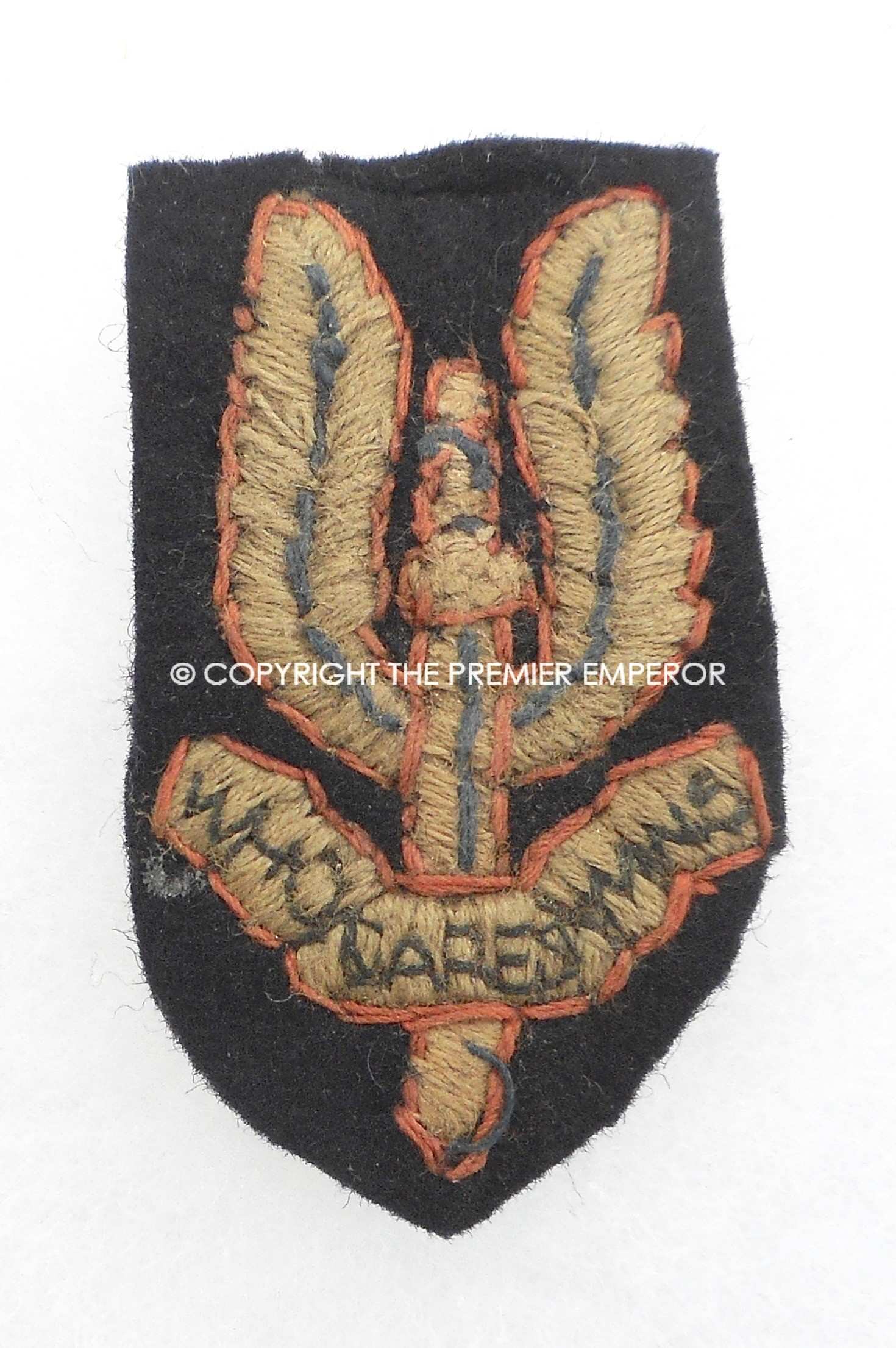 British World War Two 1st type S.A.S.(Special Air Service)cloth beret/hat badge. Circa.1943