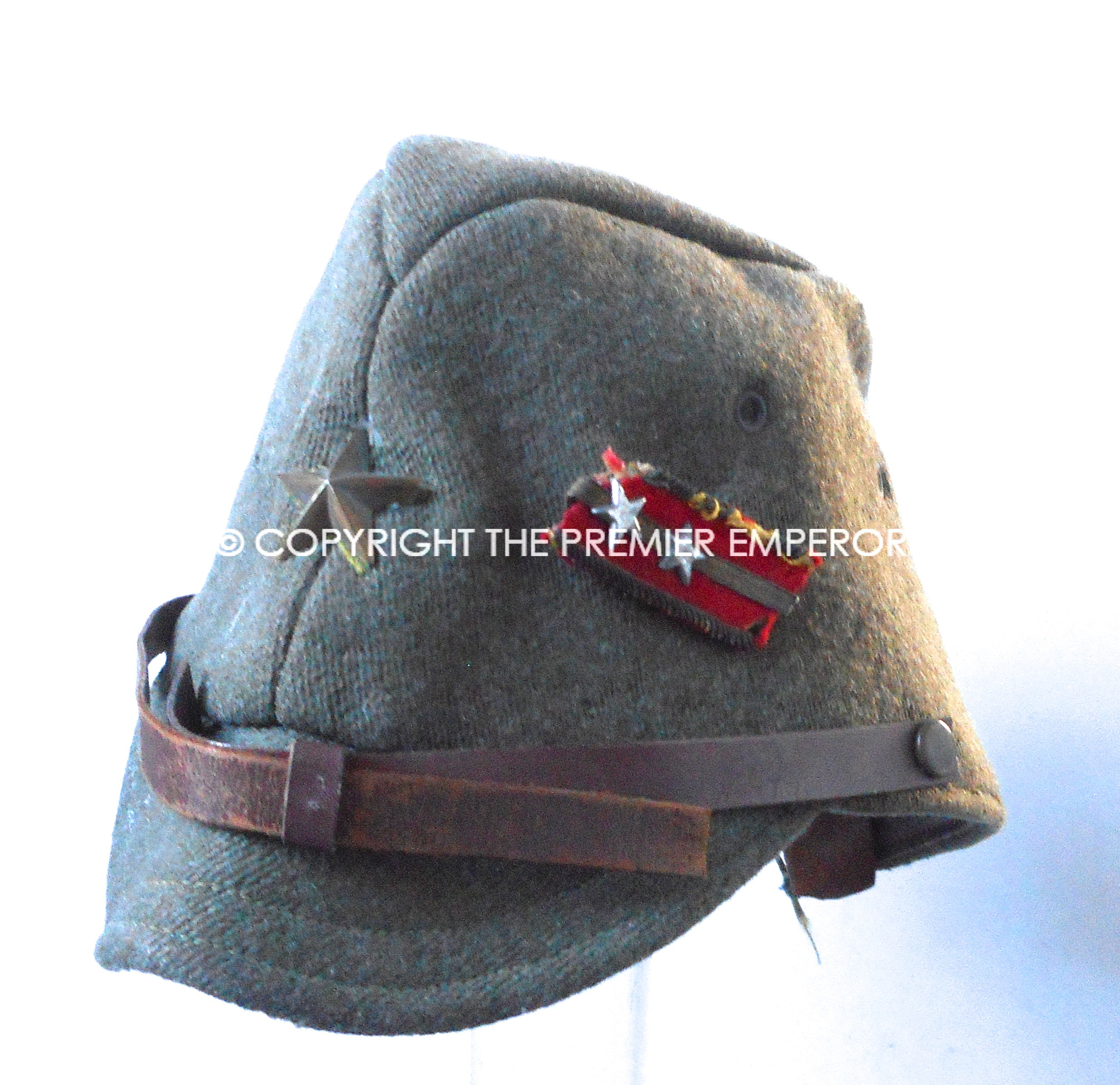 Japan. World War Two Japanese Army Officer's cap with collar rank badge pinned to side.Circa.1941/45