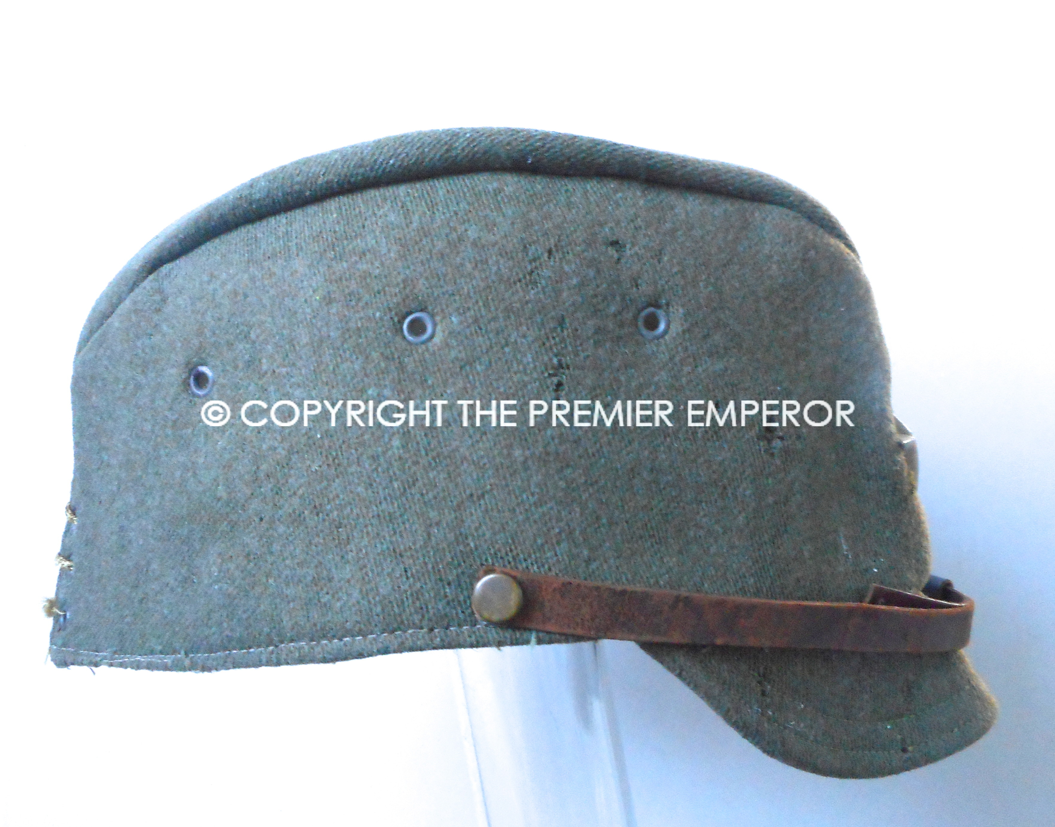 Japan. World War Two Japanese Army Officer's cap with collar rank badge pinned to side.Circa.1941/45