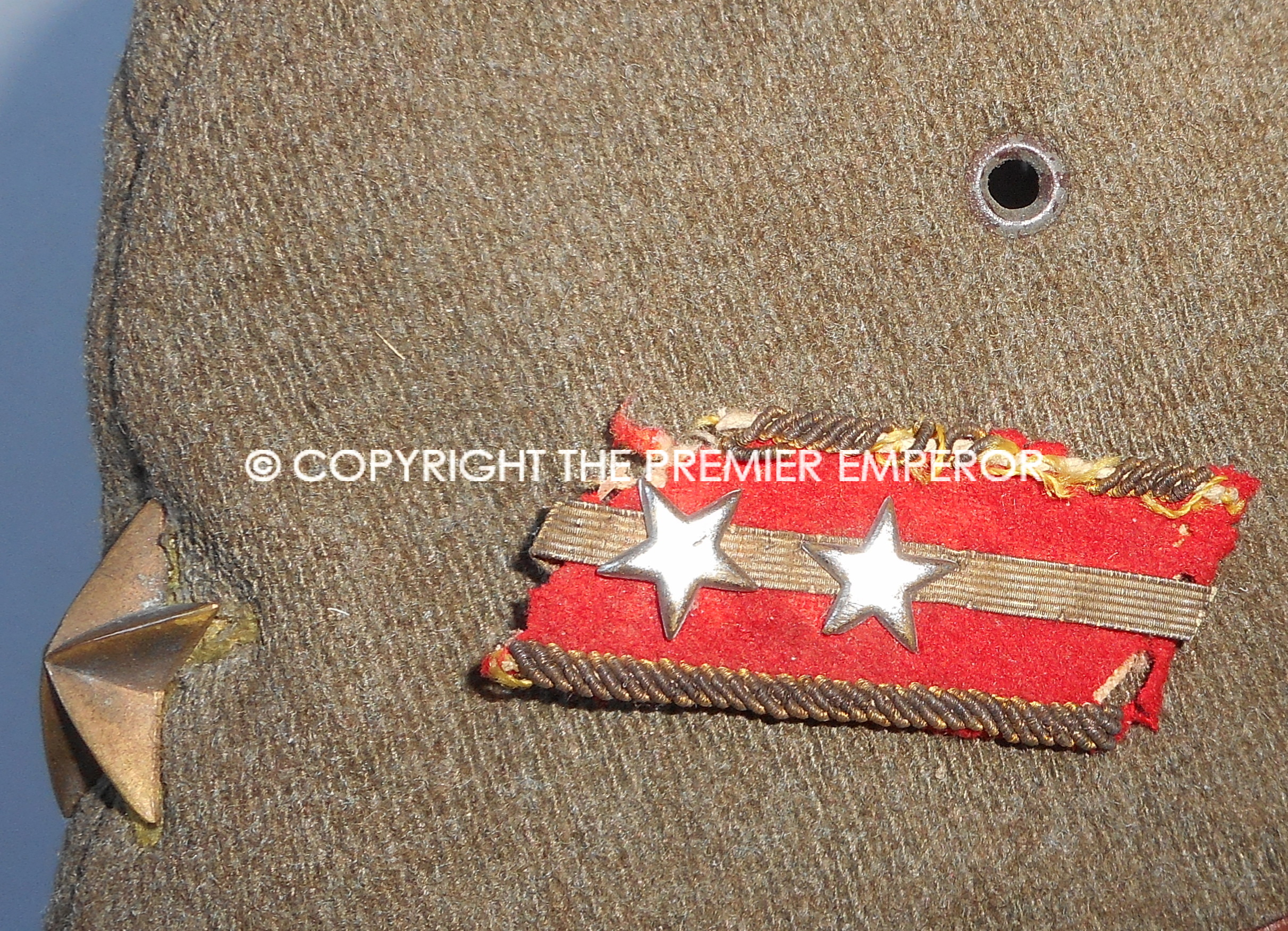 Japan. World War Two Japanese Army Officer's cap with collar rank badge pinned to side.Circa.1941/45