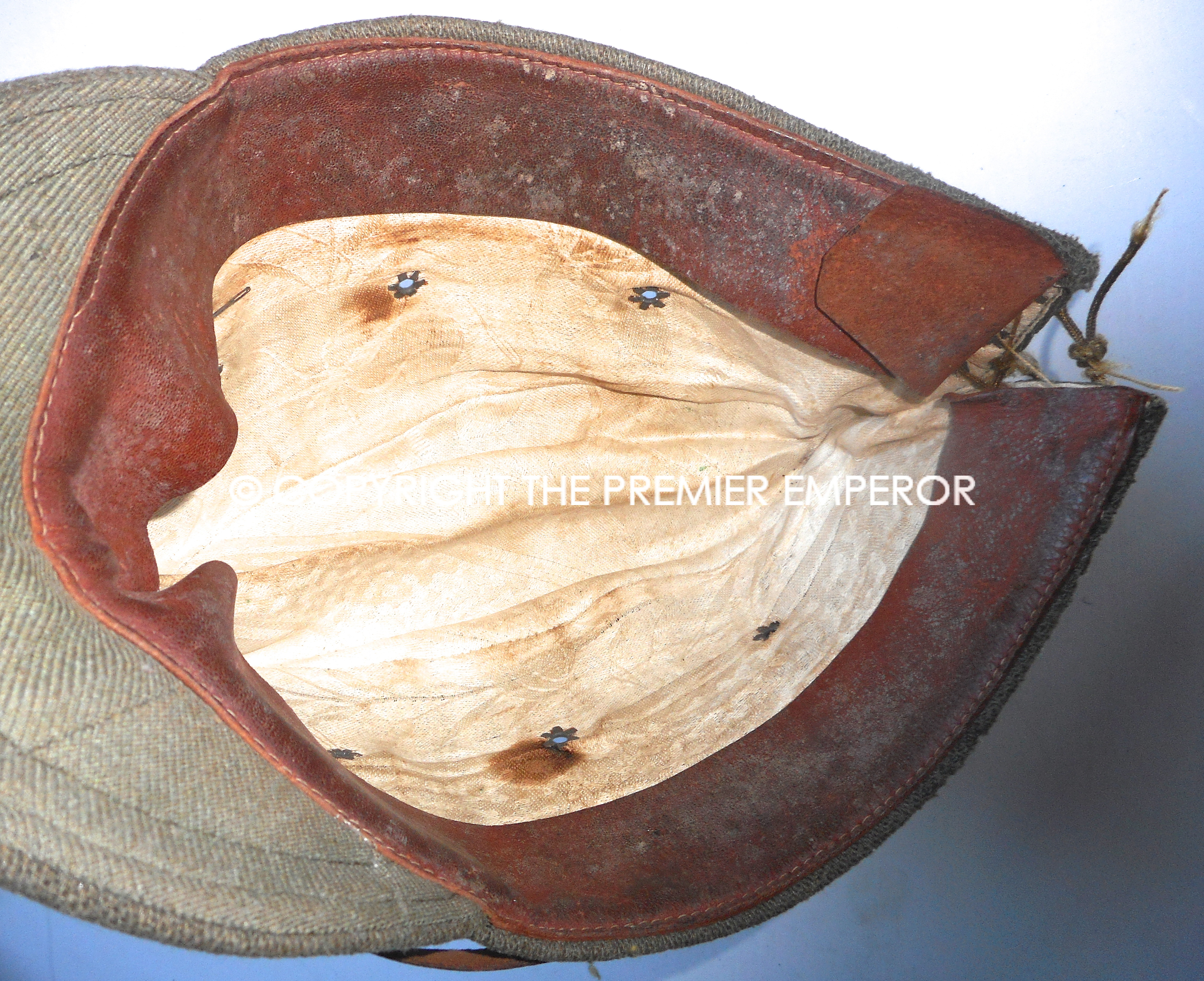 Japan. World War Two Japanese Army Officer's cap with collar rank badge pinned to side.Circa.1941/45